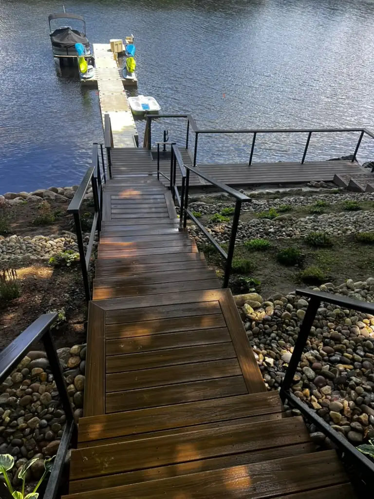 Composite steps leading down to a lake dock after power washing
